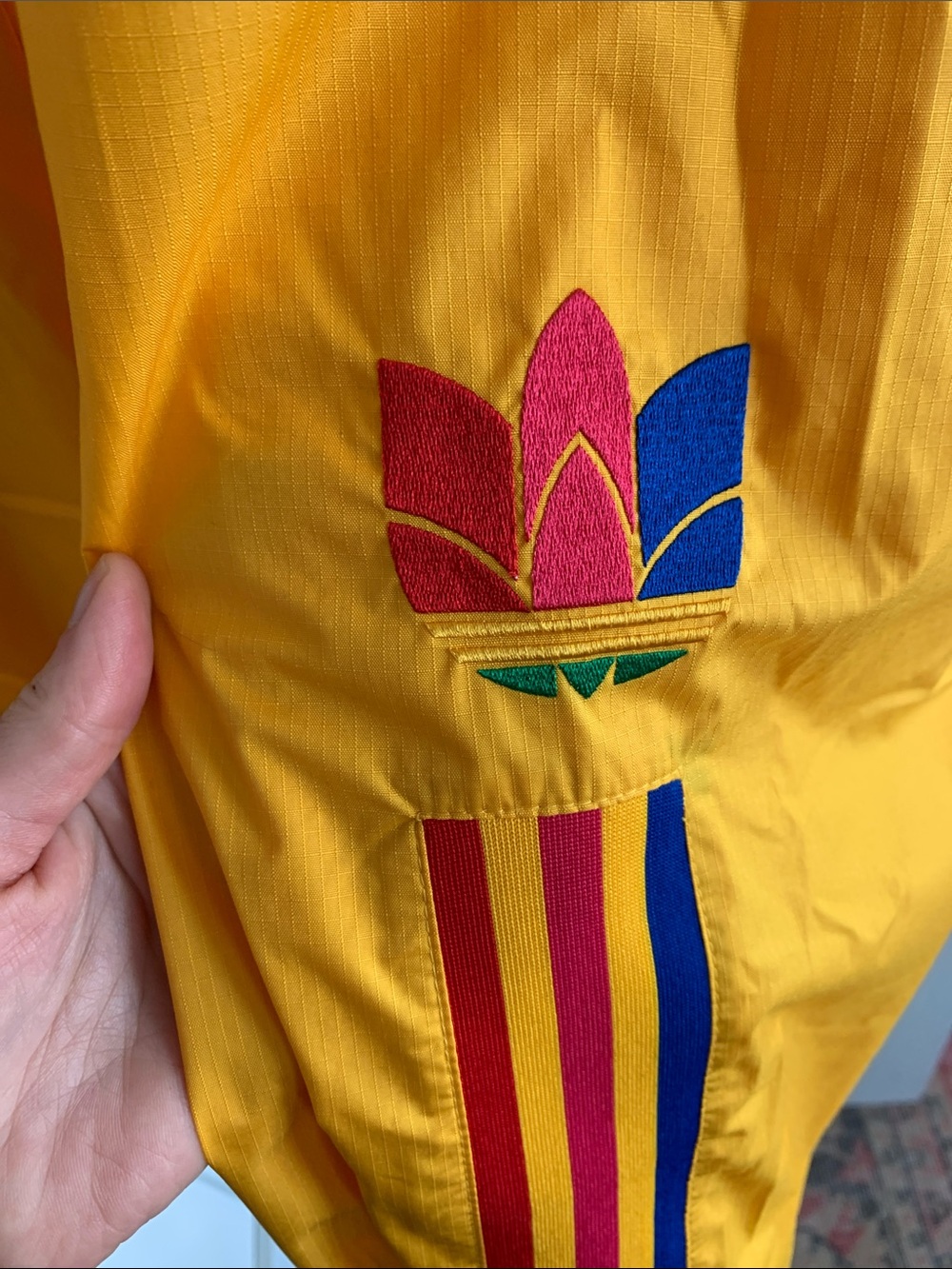 Men’s Yellow adidas Track Pants with Multicolor Trefoil Stripe - Picture 2 of 5